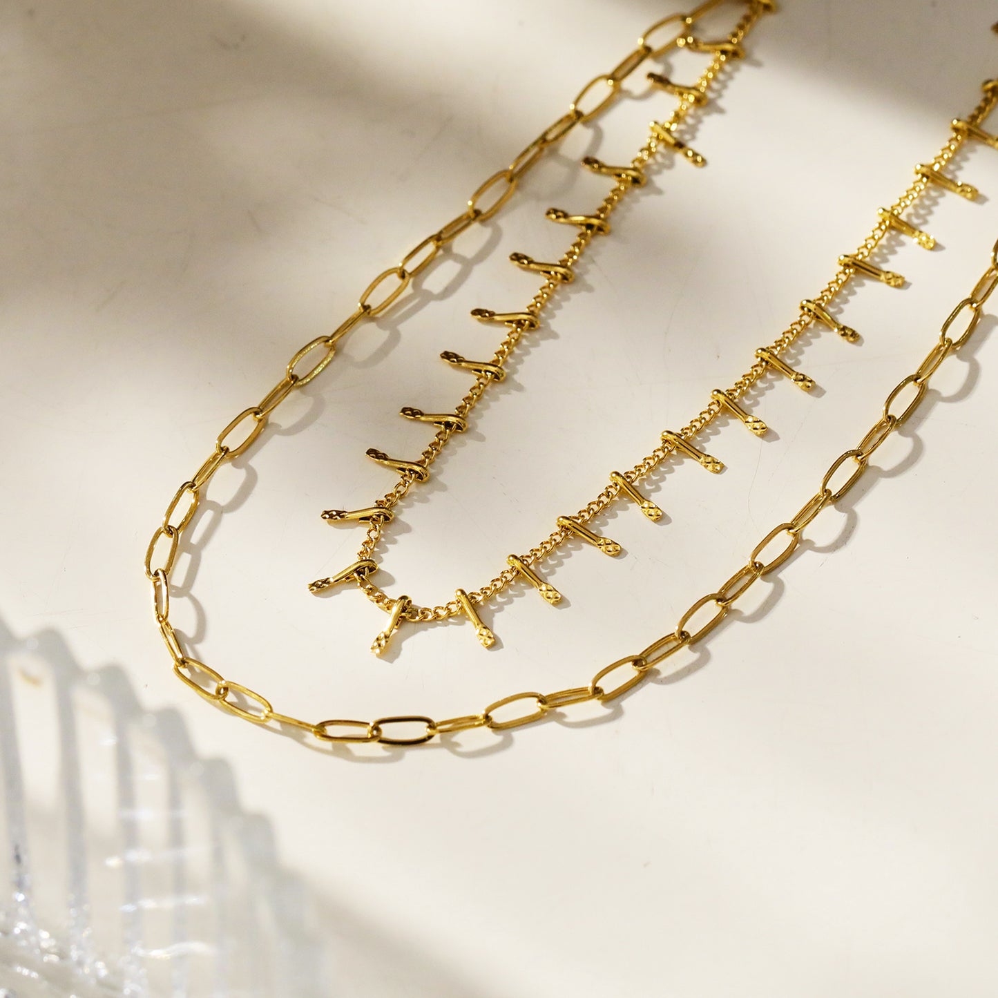 Style BRONTE 85460: Layered 2-Chain Necklace with Minimalist PaperClip Chain & Ornate Hook Chain.