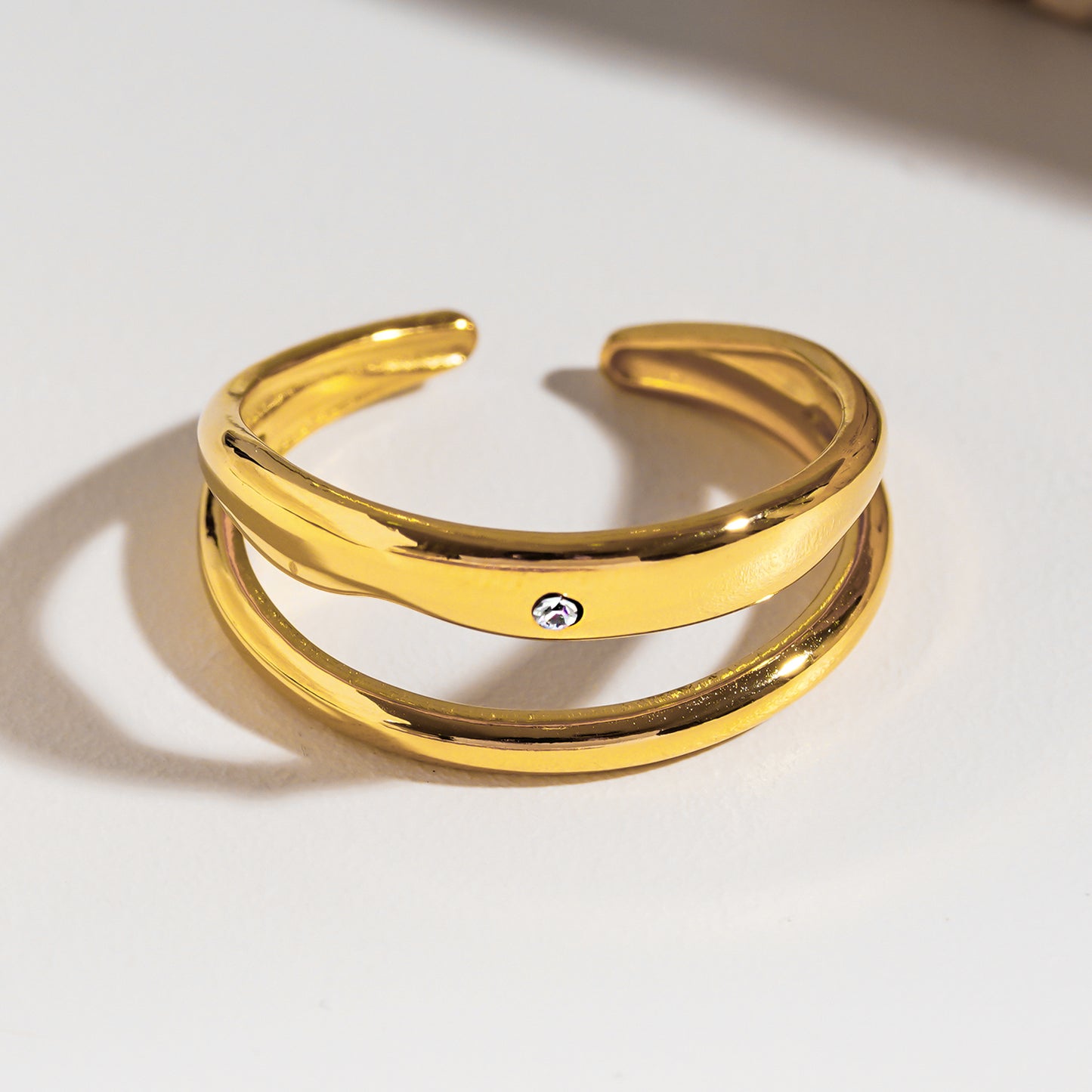 Style CARMELITA 8607: Modern Minimalist Double Band Solitaire Zirconia Ring.