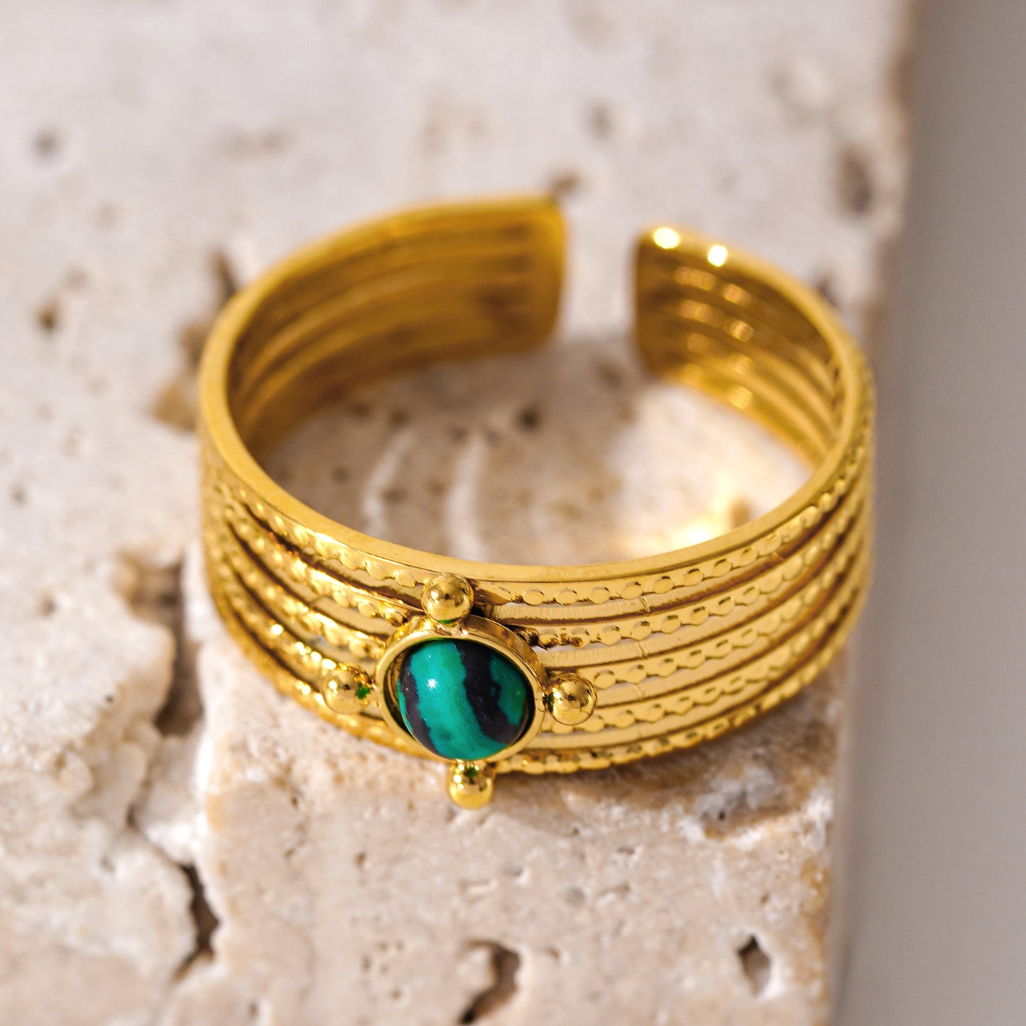 Style CHARMA 1996: 5-Layer Circle Embossed Ring with a Malachite Stone Centre Piece.