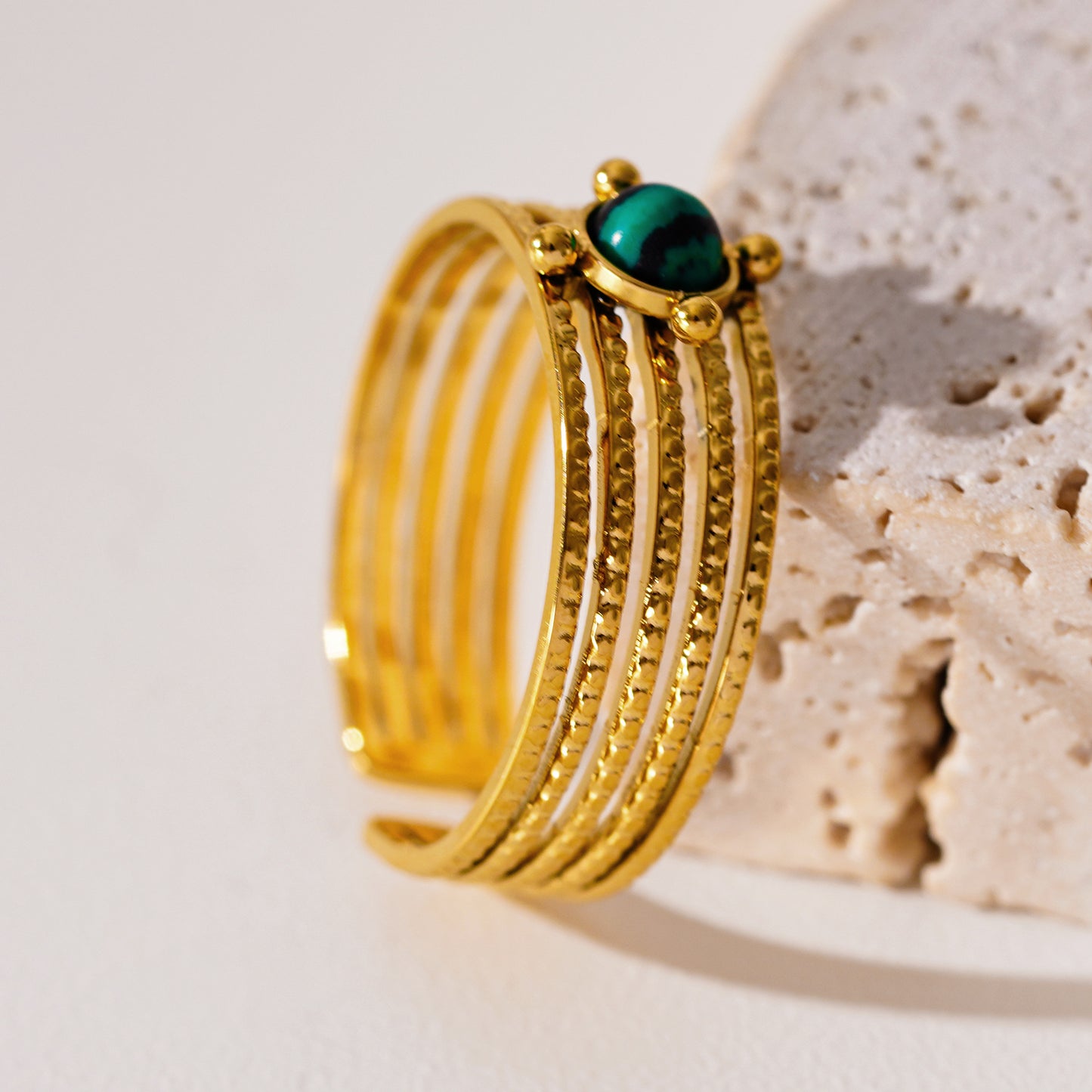 Style CHARMA 1996: 5-Layer Circle Embossed Ring with a Malachite Stone Centre Piece.