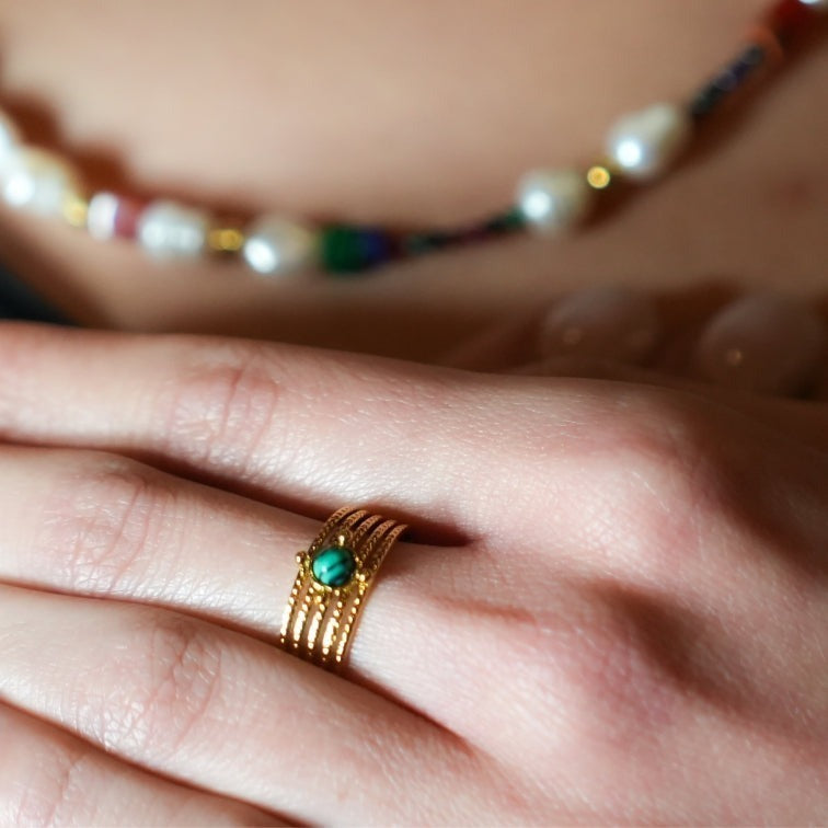 Style CHARMA 1996: 5-Layer Circle Embossed Ring with a Malachite Stone Centre Piece.