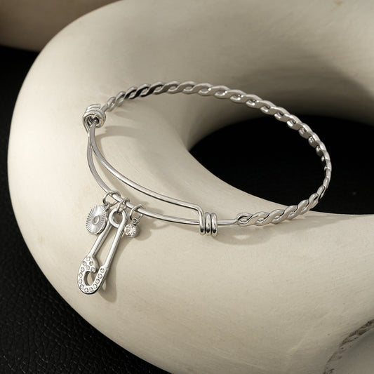 CHRISTINA: Serpent Charm Adorned White Gold Bracelet