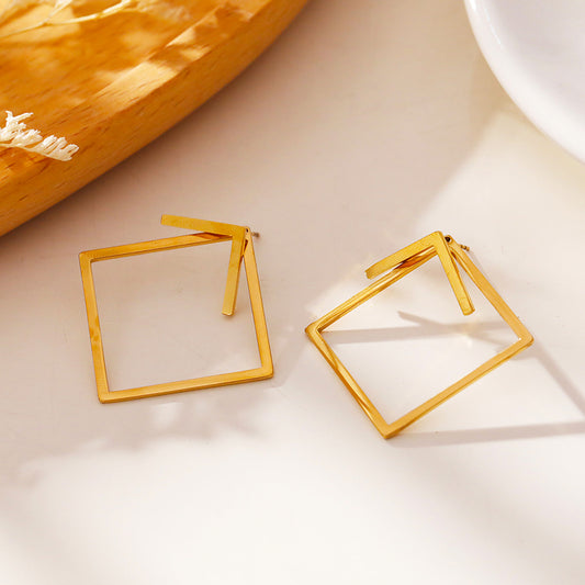Style: COSTINA 56460 Geometric Hoop & Stud Combo Earrings.