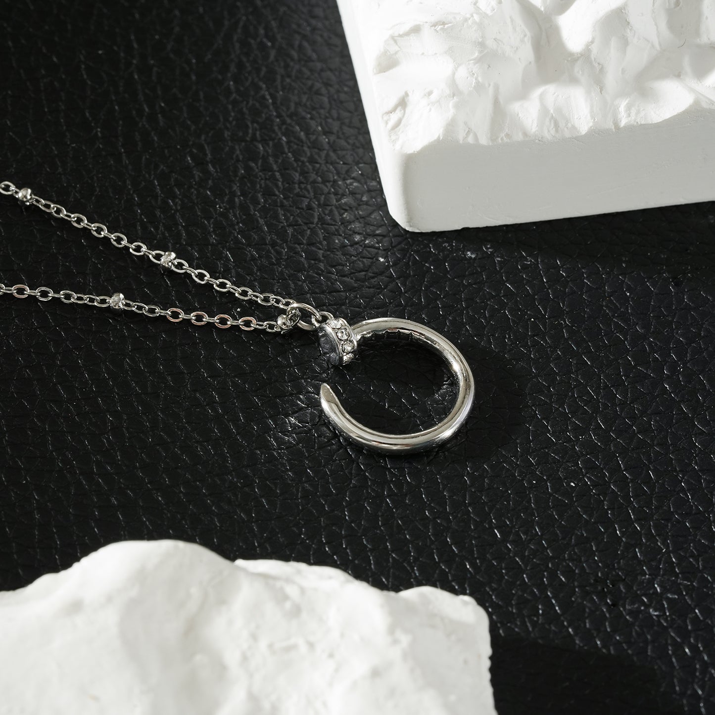 CSENGE Silver (White Gold) Necklace:  Zirconia Embedded Circular Nail Pendant on a Satellite Beaded Chain