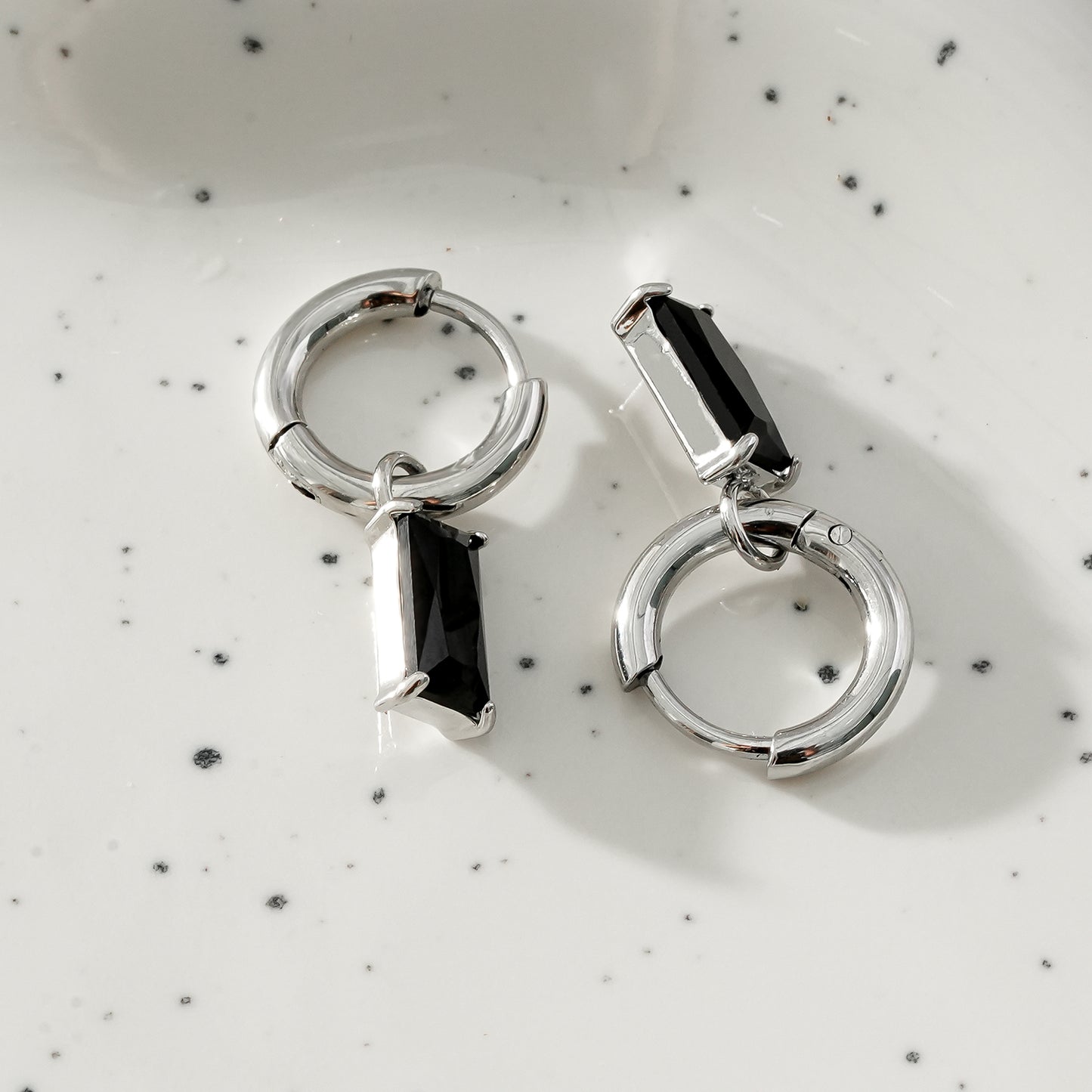 DAYSIA White Gold (Silver Toned): Vintage Inspired Encased Black Crystal Drop Earrings.