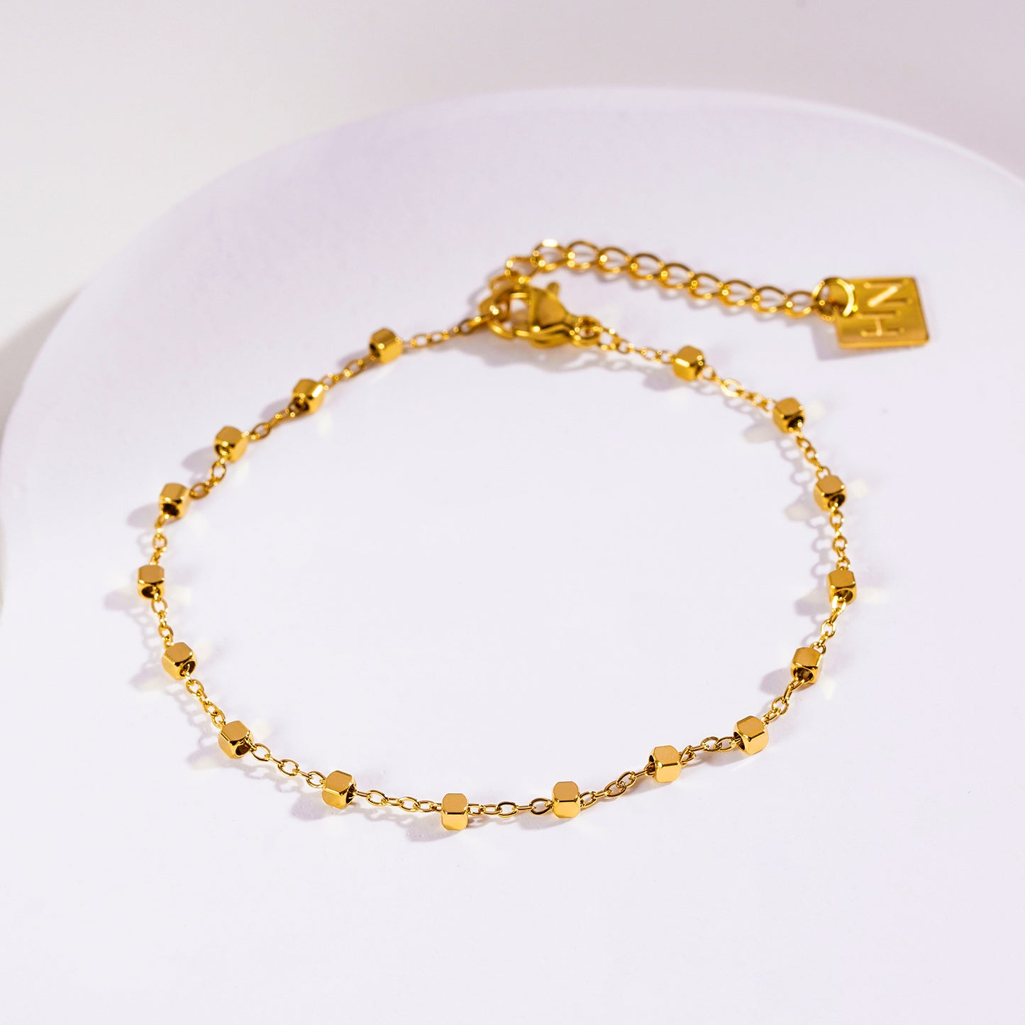 Style: DEMELZA: Essential Daily Bracelet with Delicate Square Beads.