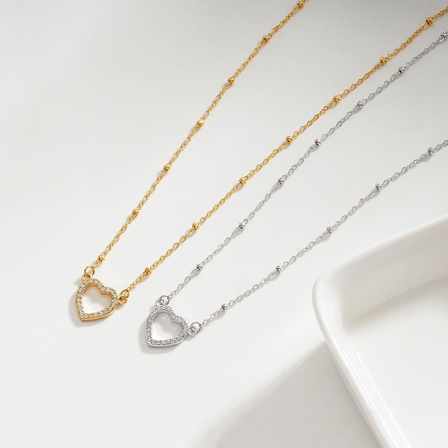 CHERISH Silver (White Gold): Beaded Chain Anchoring an Elegant Pavé Heart Charm Pendant