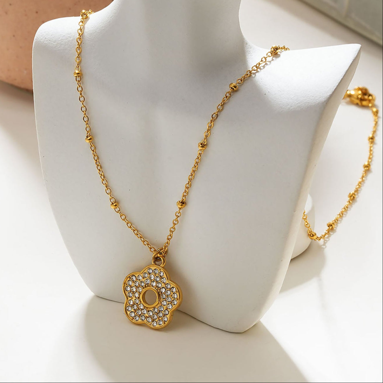 MELRINA Gold Vintage Bloom: Beaded Chain Necklace with Pave Zirconia Flower Charm