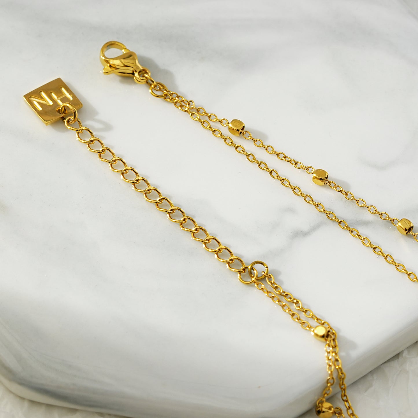 Style HILDA LG 5954: Two in One Square Beads & Round Beads in Black & Gold Anklet.