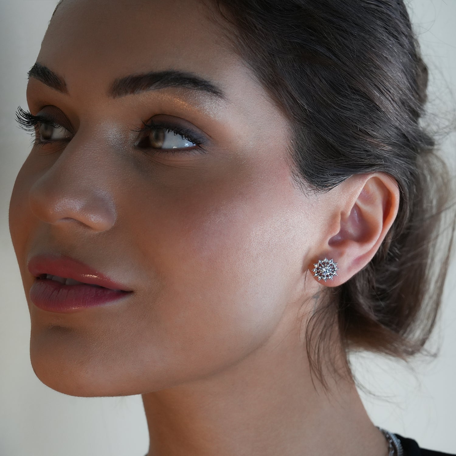 KERELA White Gold (Silver Toned): Shimmering Star Zirconia Stud Earrings