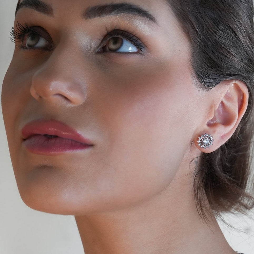 KERELA White Gold (Silver Toned): Shimmering Star Zirconia Stud Earrings