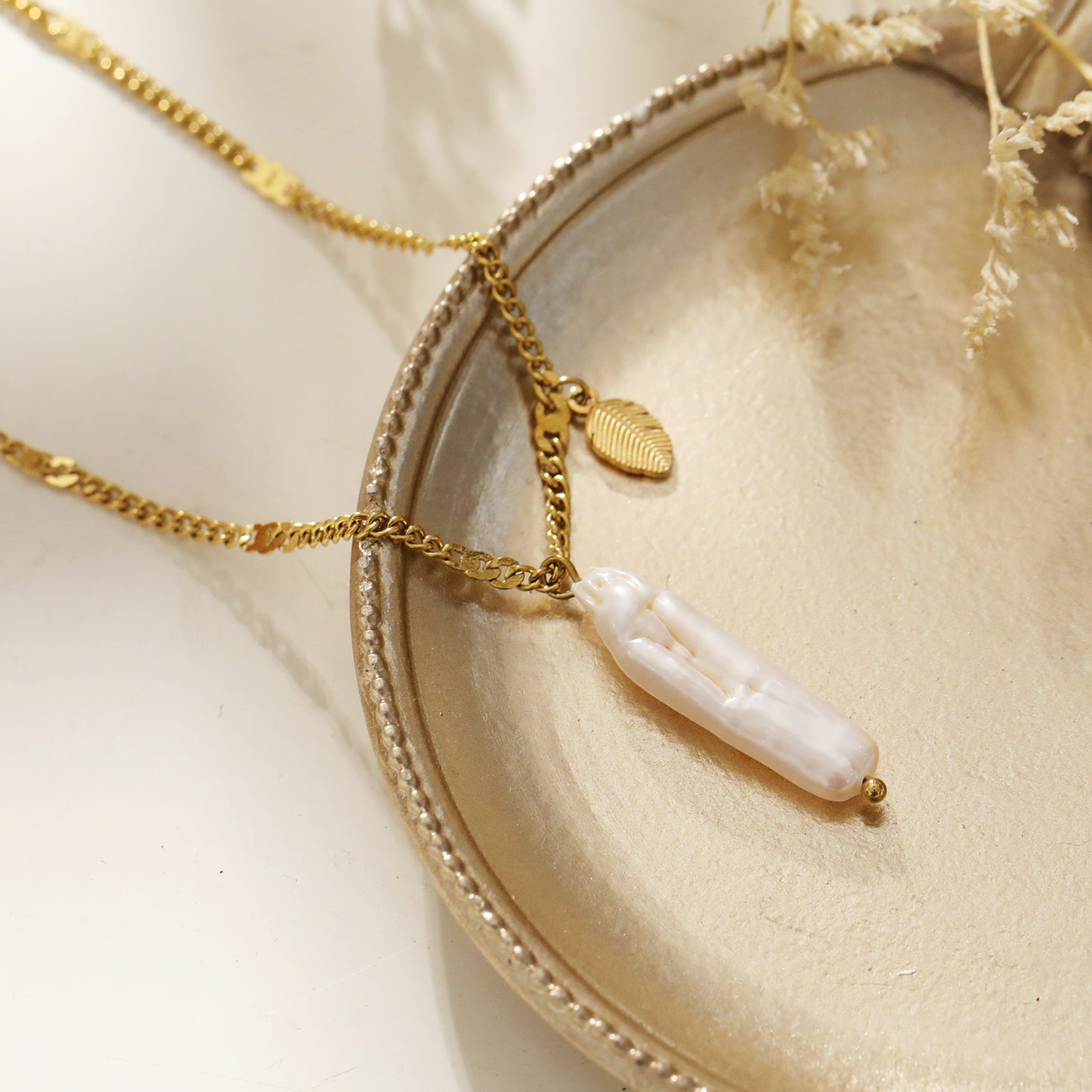 Timeless Baroque Pearl Pendant Necklace with Leaf Charm