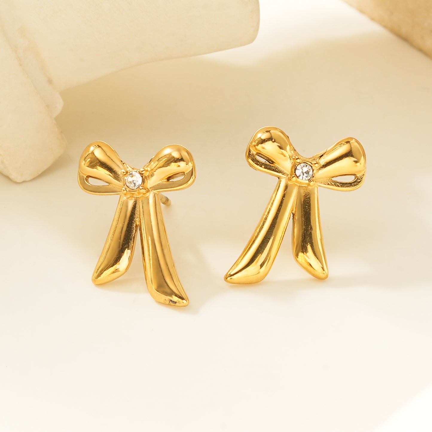 Elegant small bow earrings with sparkling cubic zirconia stone for women