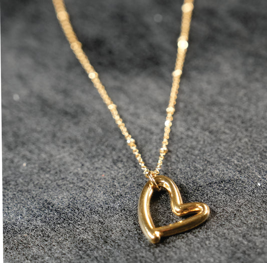 SMITTEN Gold: Dainty Beaded Chain Anchoring an Abstract Heart Shaped Pendant