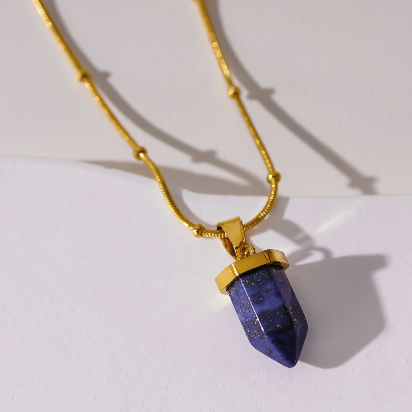 VIOLA: Lapis Lazuli Stone Pendant Anchored on a Beaded Snake Skin Textured Chain Necklace