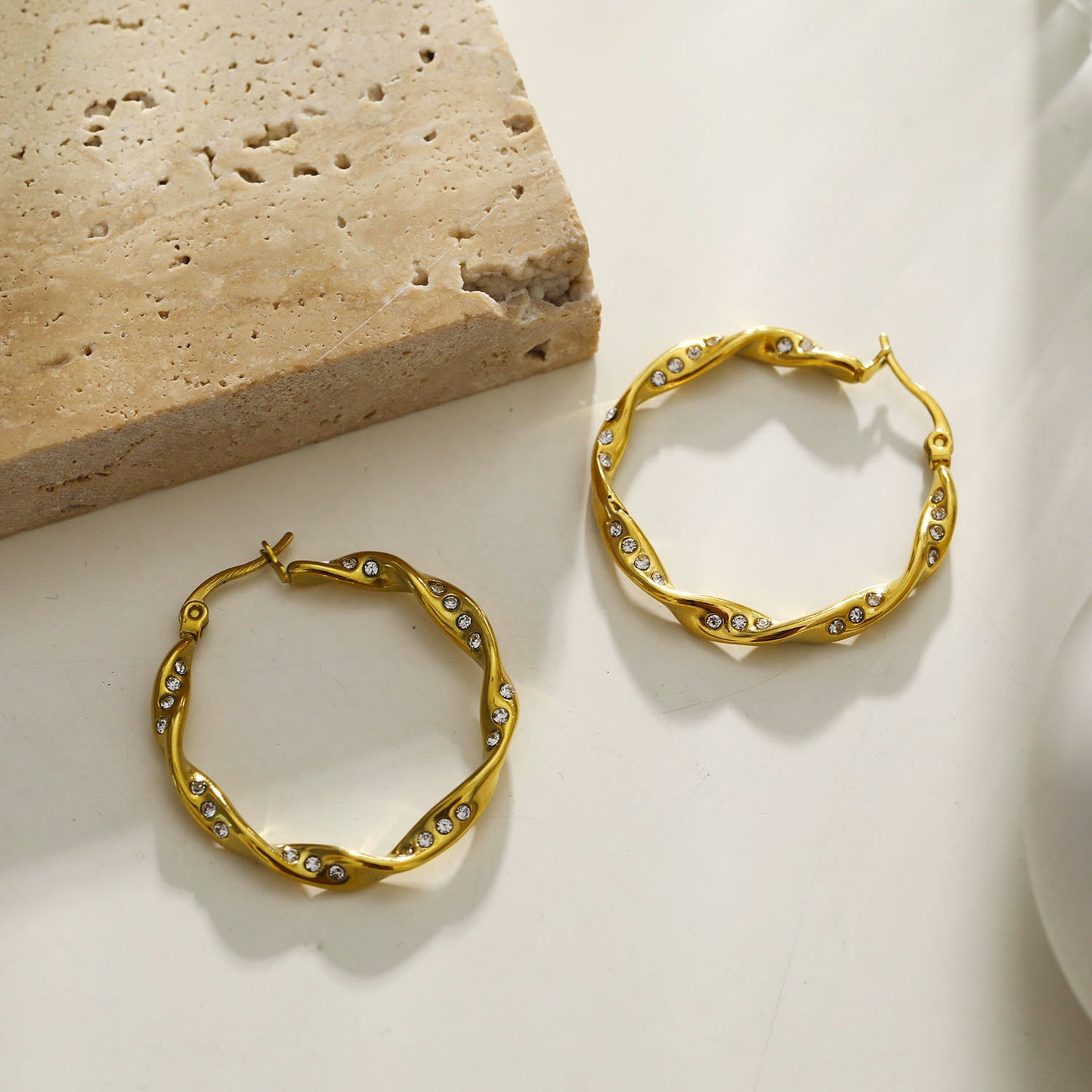 hackney-nine | hackneynine | necklace | hoops | bracelets | earrings | charms | studs_earrings | jewellery | jewellery-store | shop-jewelry | gold-jewellery | silver-jewellery | dressy_jewellery | classy_ jewellery | on_trend_jewellery | fashion_ jewellery | cool_jewellery | affordable_jewellery | designer_jewellery | vintage_jeweler | gifts-for-her | gifts-for-mum | gifts-for-girls | gifts-for-females | dainty-jewellery | bridesmaid-gift | zirconia hoops | hoops-earrings | twisted-hoop-earrings |
