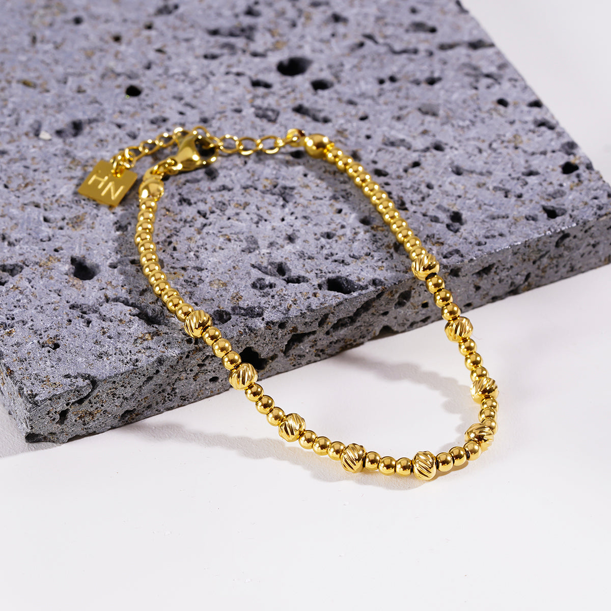Style ANNABETH 7580: Twin-Bead Fusion Gold Chain Bracelet.