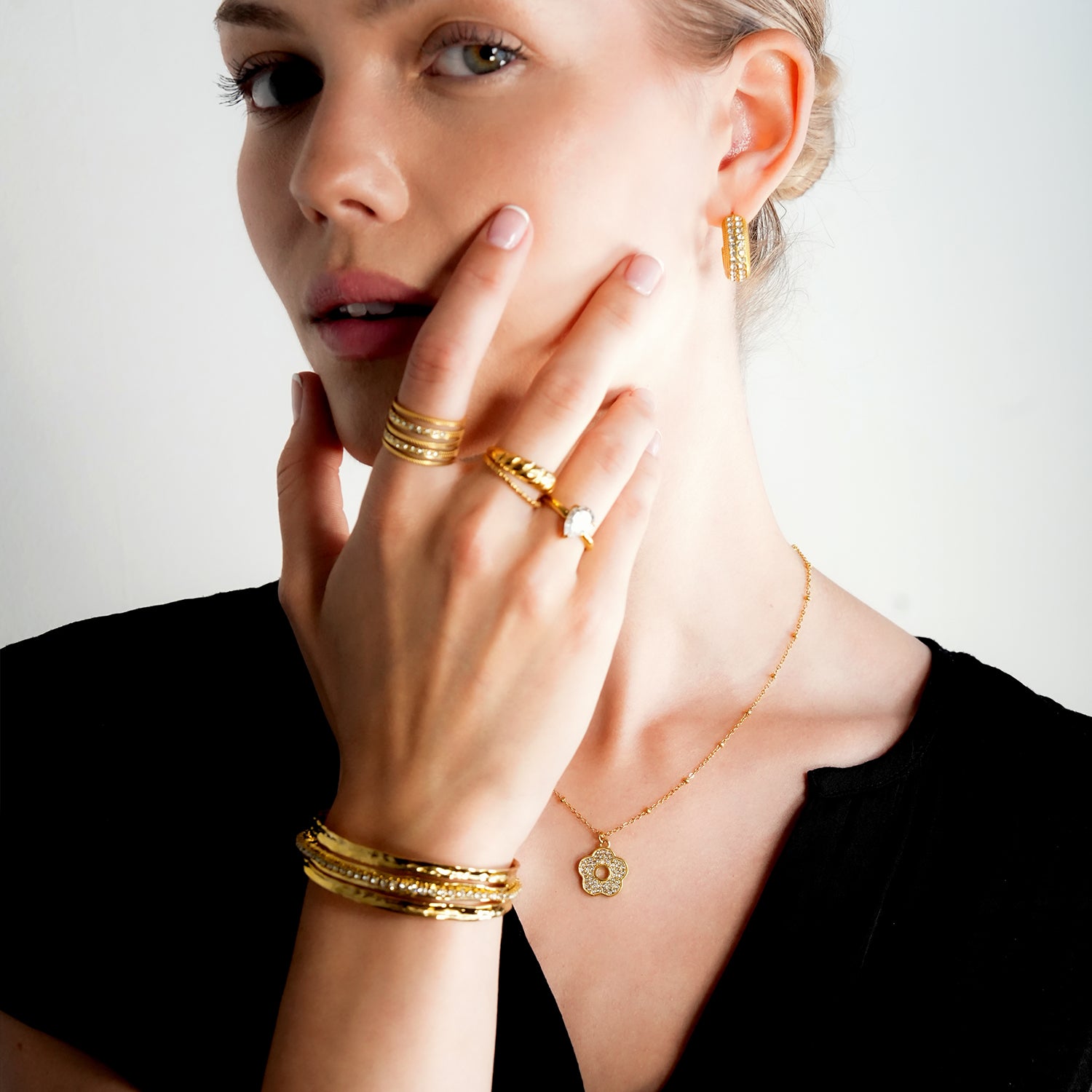 BELLINA Gold: Triple Stacked Textured Bracelet Zirconia (CZ) Embedded Tennis Bracelet at Centre. Stacked for Glamour.