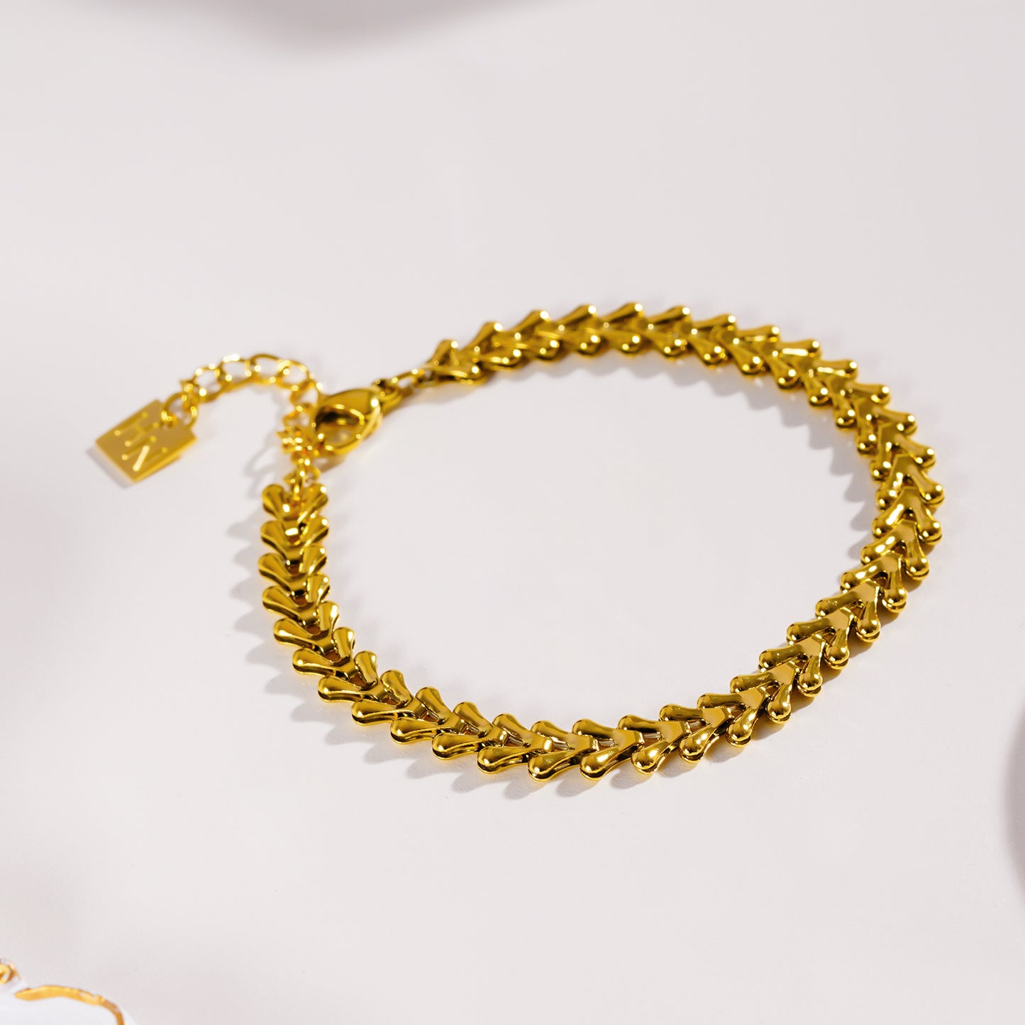 Style BLYTH 0300:  Vintage-Inspired Linked Abstract Crest Bracelet.