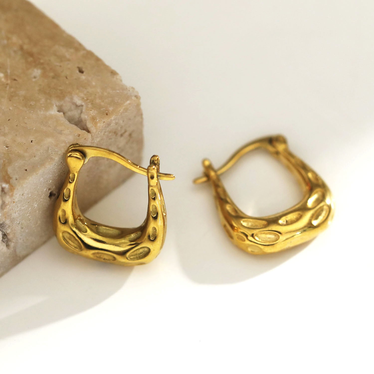 Style CALAVINO 122242: Hammered Horse-Shoe Hoop Earrings.
