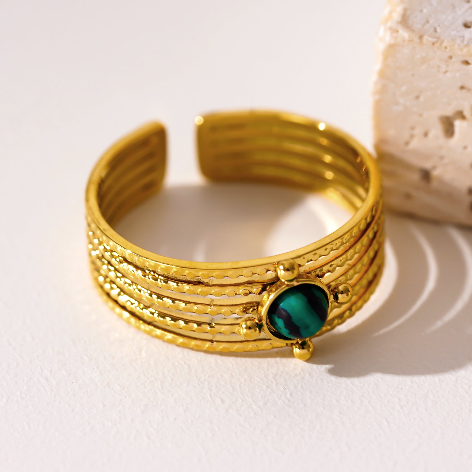 Style CHARMA 1996: 5-Layer Circle Embossed Ring with a Malachite Stone Centre Piece.