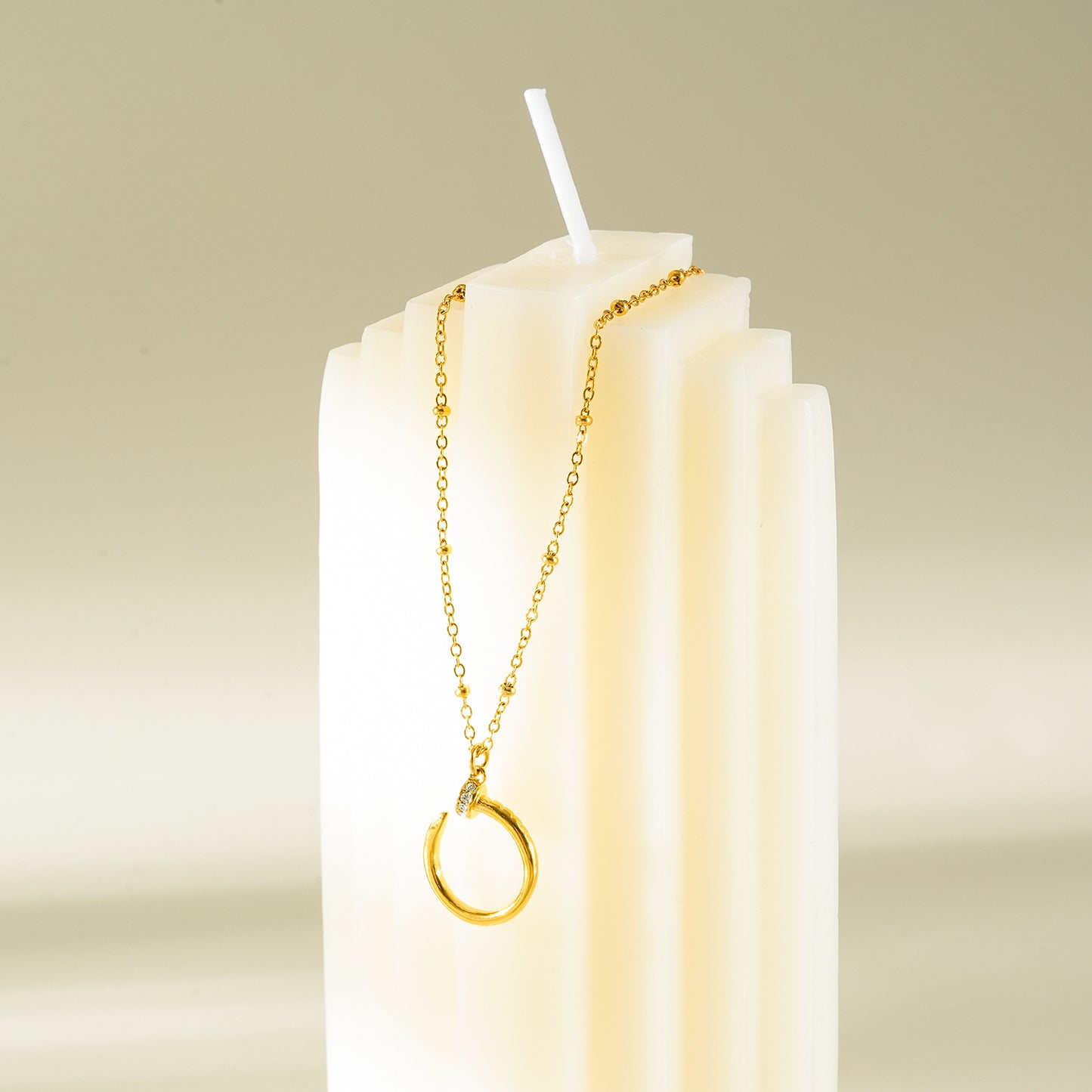 CSENGE Gold Necklace:  Zirconia Embedded Circular Nail Pendant on a Satellite Beaded Chain