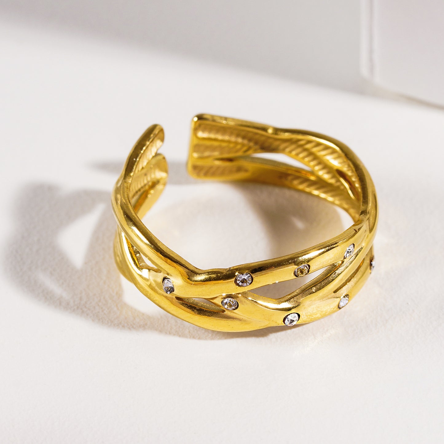 Style DARI 7234: Intertwined Stacked Ring with Mini Zirconia Highlights