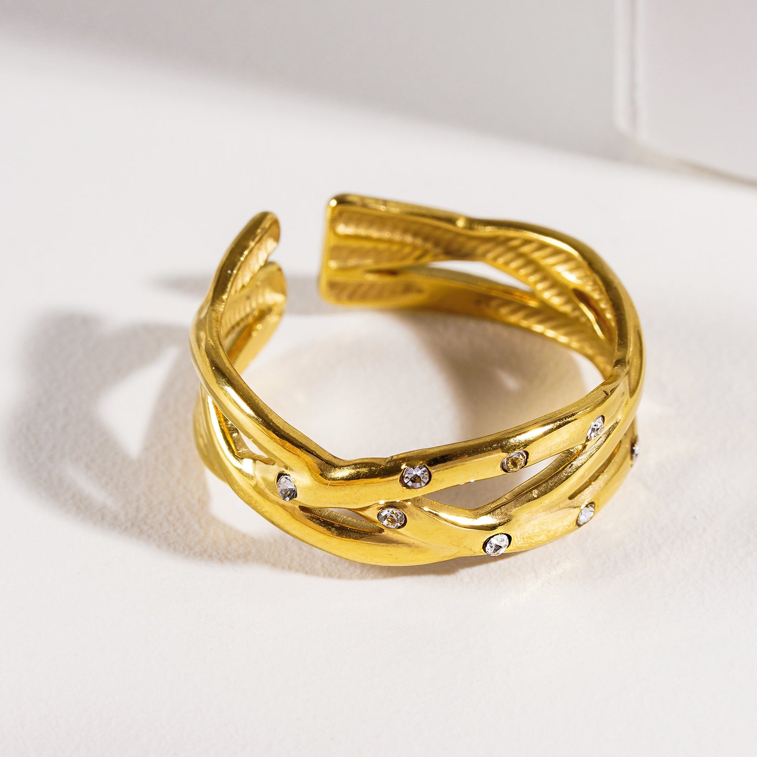Style DARI 7234: Intertwined Stacked Ring with Mini Zirconia Highlights