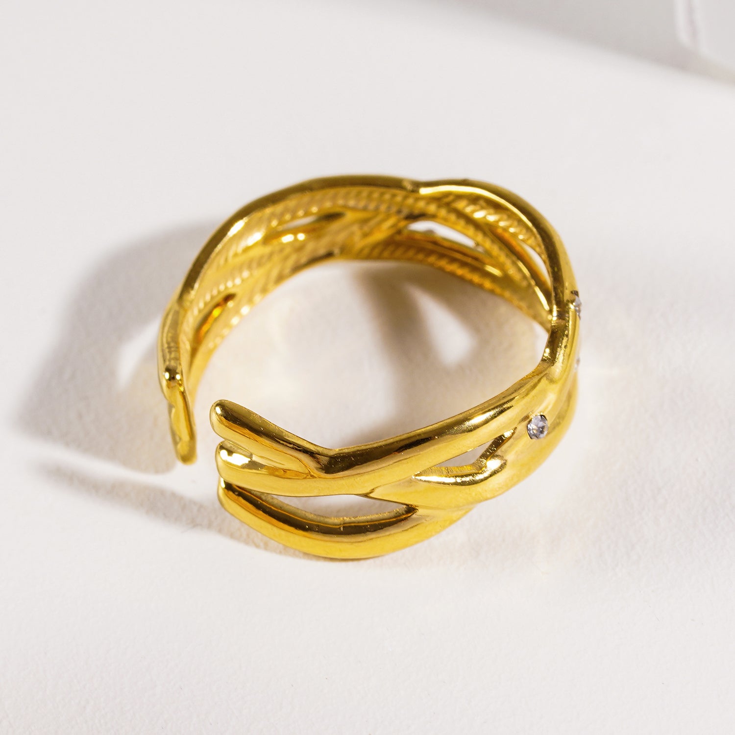 Style DARI 7234: Intertwined Stacked Ring with Mini Zirconia Highlights