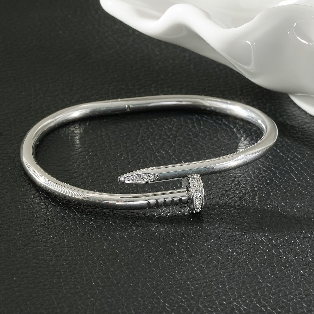 DAVIDKA Silver (White Gold): Zirconia Embedded Industrial-Chic Twisted Nail Bracelet