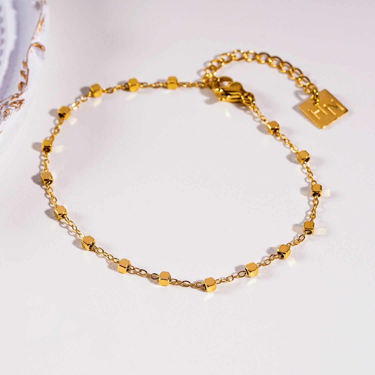 Style: DEMELZA: Essential Daily Bracelet with Delicate Square Beads.
