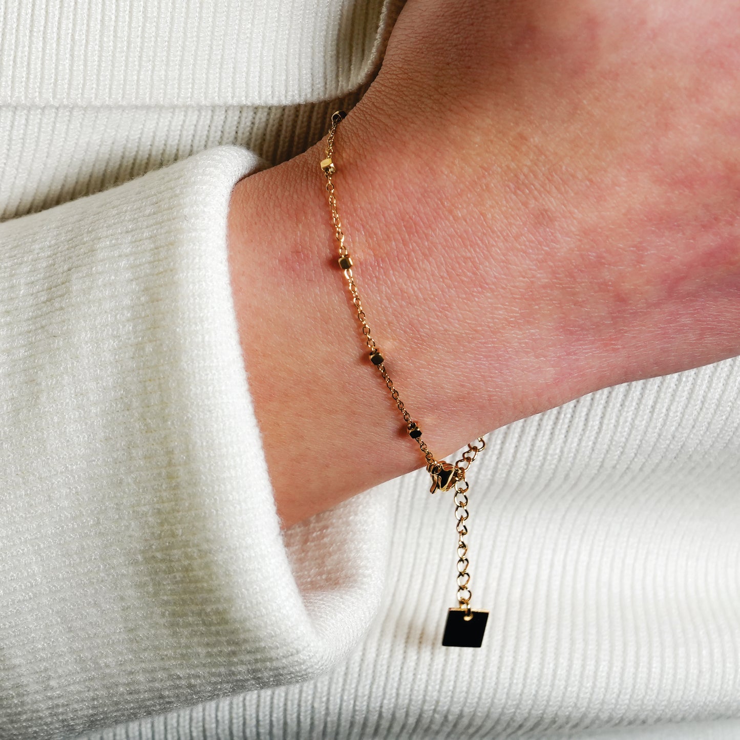 Style: DEMELZA: Essential Daily Bracelet with Delicate Square Beads.