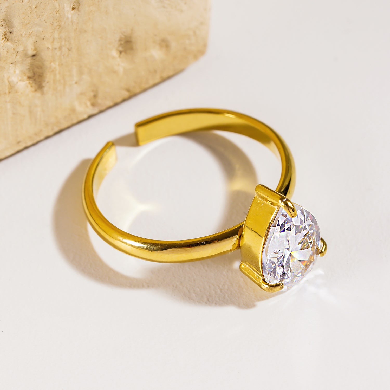 Style DIMONDA 3465: Classic Gold Ring with Prominent Teardrop Zirconia Centerpiece.