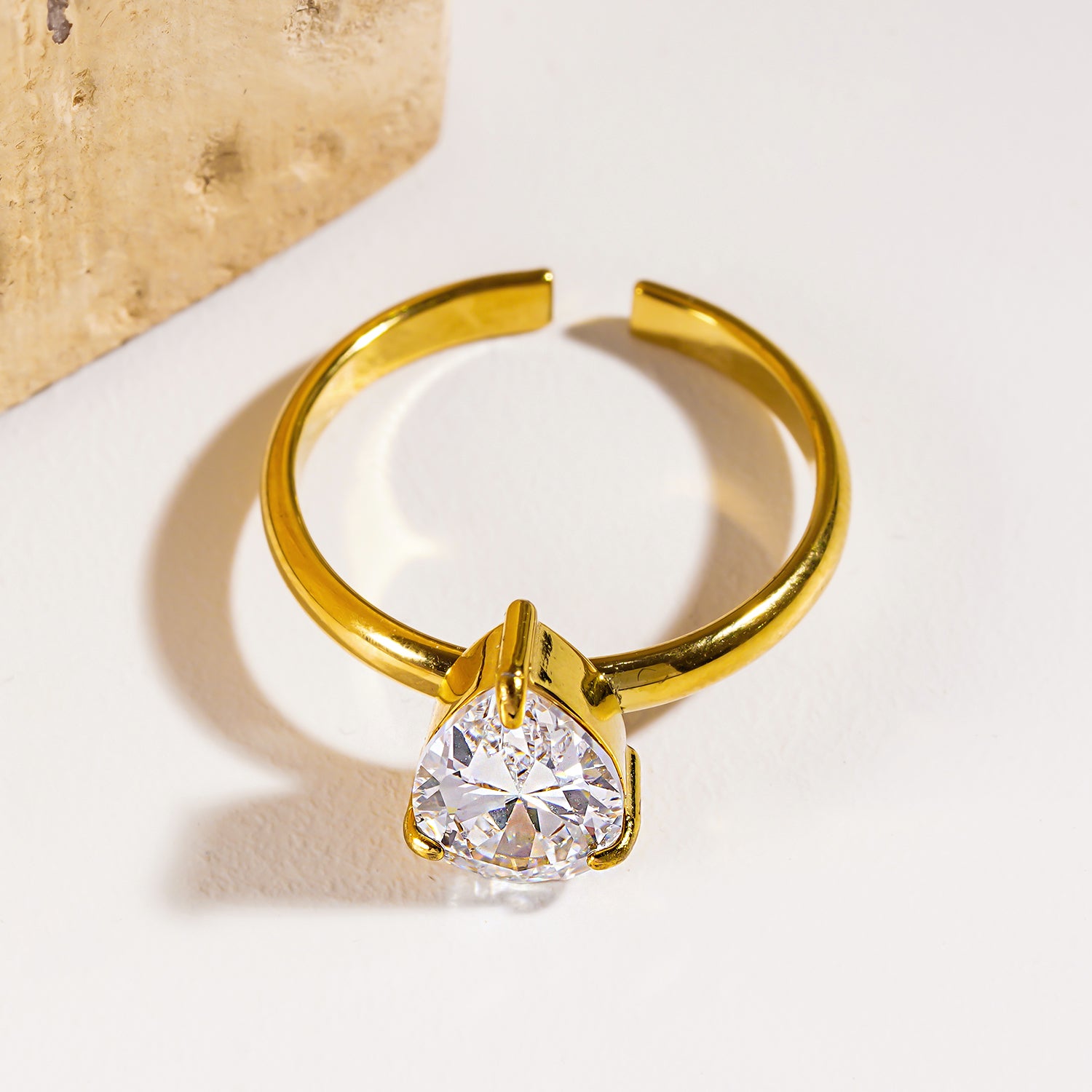 Style DIMONDA 3465: Classic Gold Ring with Prominent Teardrop Zirconia Centerpiece.