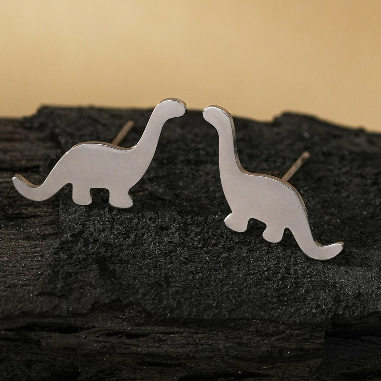 Silver dinosaur earrings hotsell