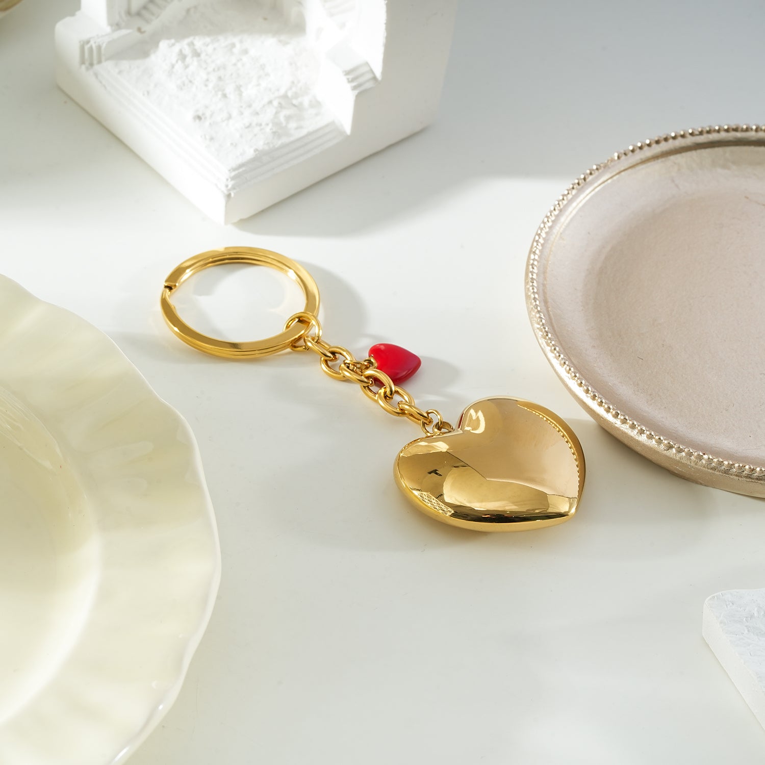 AKAMAI Gold: Golden Heart Charm Key Ring with Red Enamel Accent