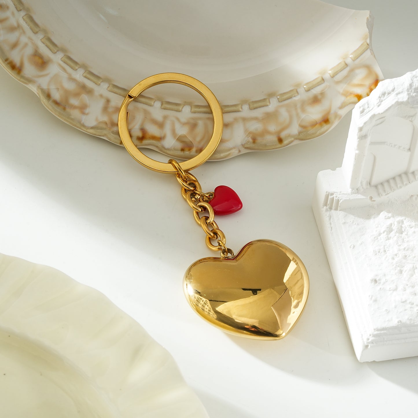 AKAMAI Gold: Golden Heart Charm Key Ring with Red Enamel Accent