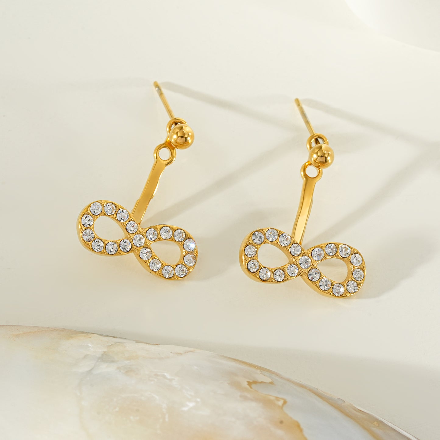 CILMILLE Gold: Mini Ball-Bead Stud Earrings Anchoring a Zirconia Infinity Charm