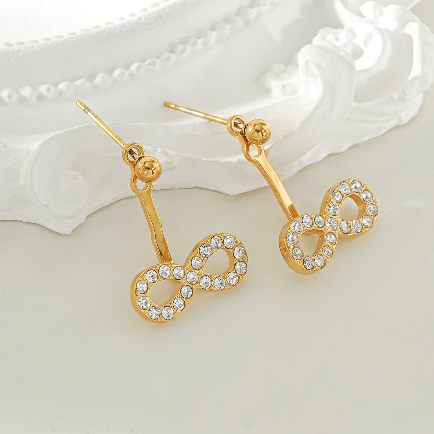CILMILLE Gold: Mini Ball-Bead Stud Earrings Anchoring a Zirconia Infinity Charm
