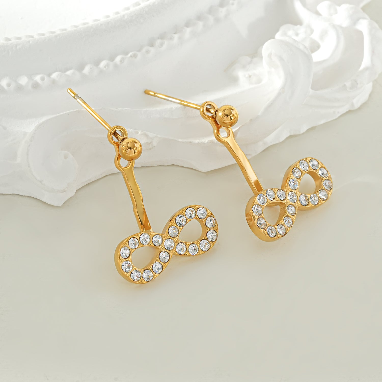 CILMILLE Gold: Mini Ball-Bead Stud Earrings Anchoring a Zirconia Infinity Charm