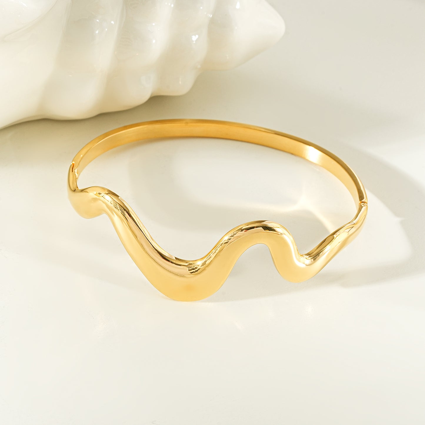 SABASTIAN Gold: Artfully Curved Avant-Garde Abstract Bracelet