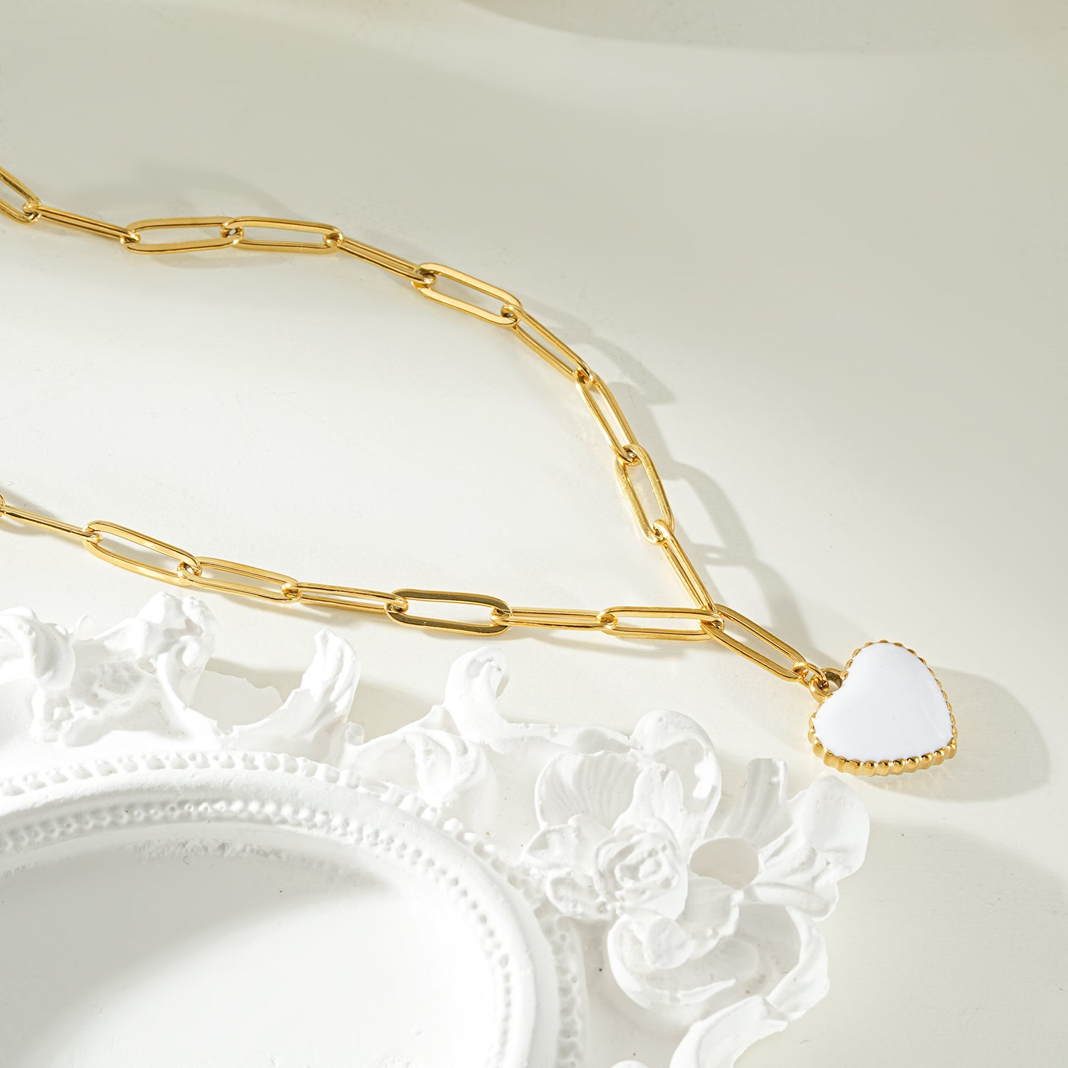 HEART WHITE Gold: Paper Clip Chain Anchoring an Enameled White Heart Charm