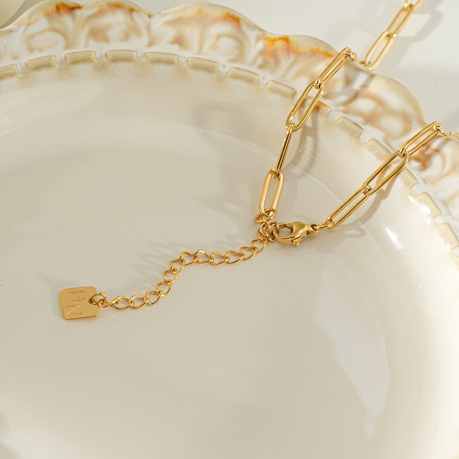 HEART WHITE Gold: Paper Clip Chain Anchoring an Enameled White Heart Charm