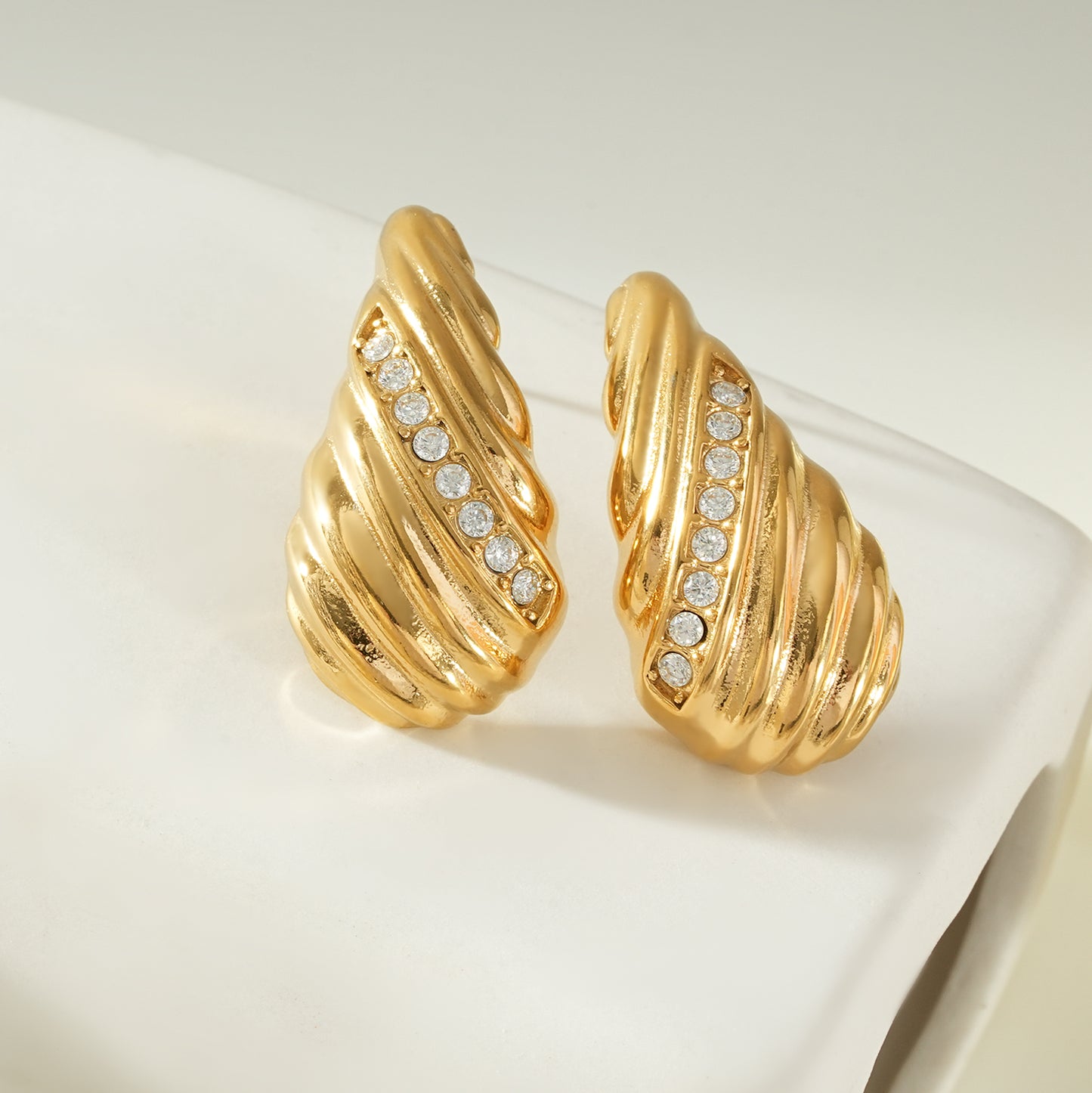 CAASHA Gold: Teardrop Statement Stud Earrings with Textured Lines & Pavé Zirconia Center