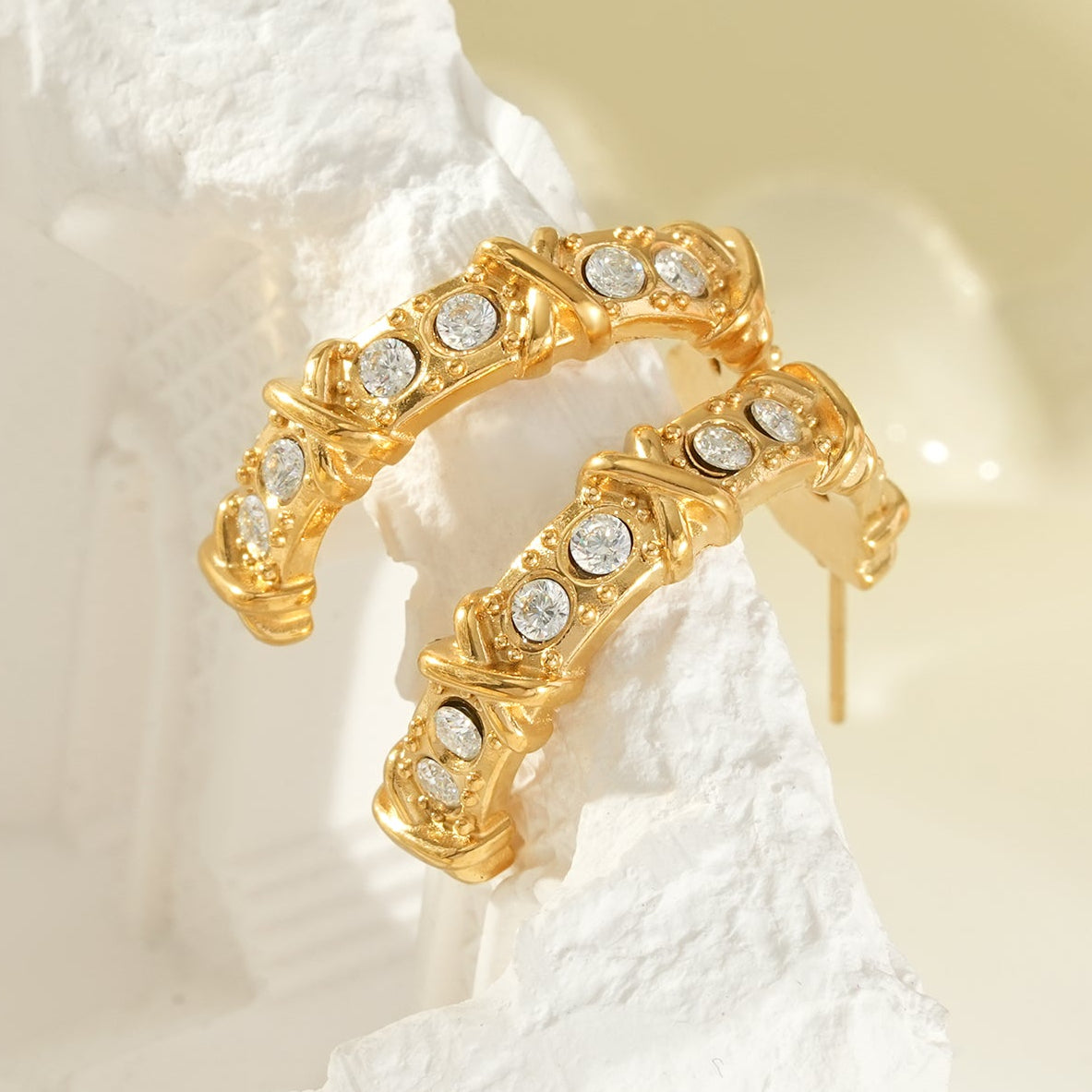ELICA Gold: Zirconia Embedded Hoop Earrings with Ornate Detail &  Crisscross Accents