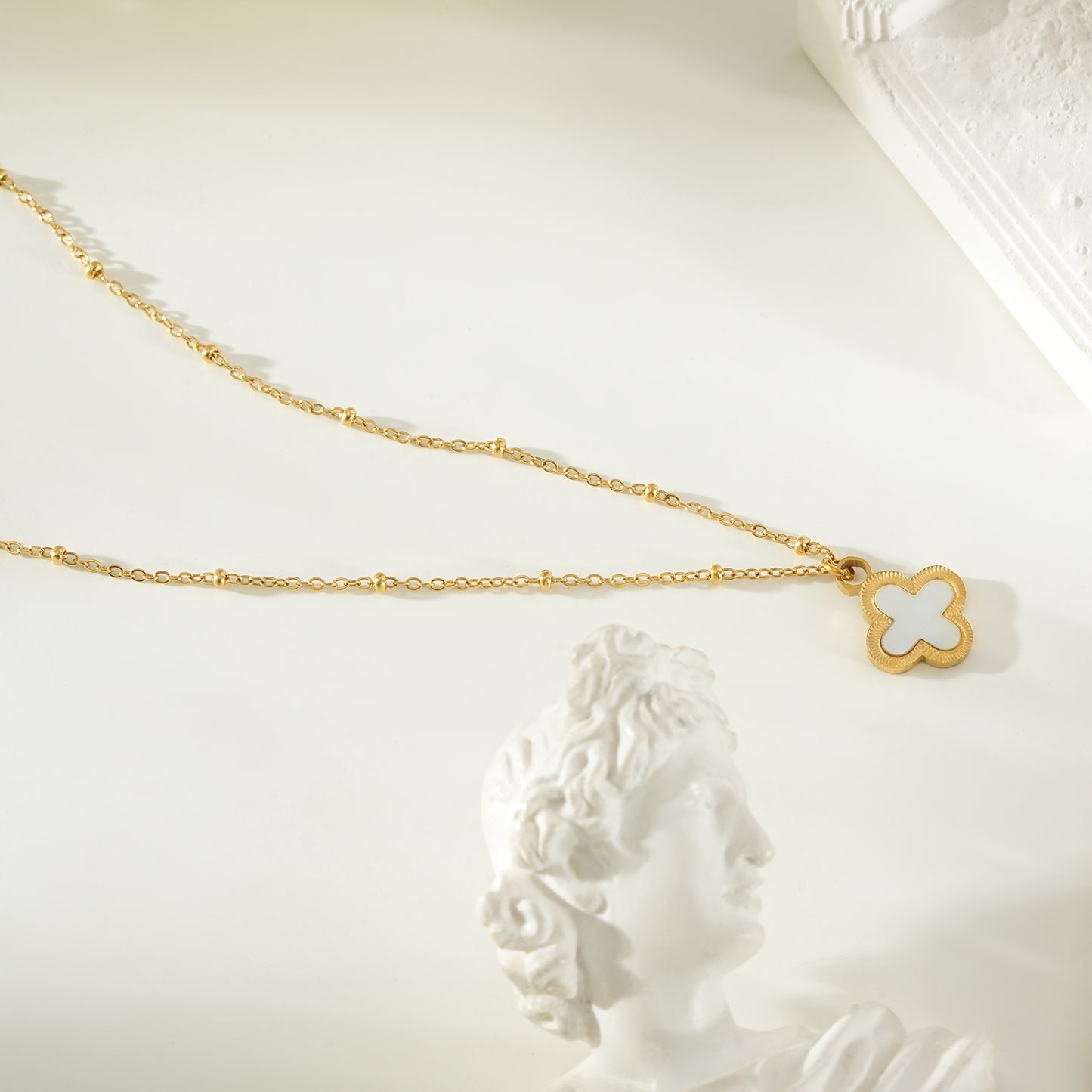 LULLA Gold: Natural Shell Clover Pendant Beaded Chain Necklace