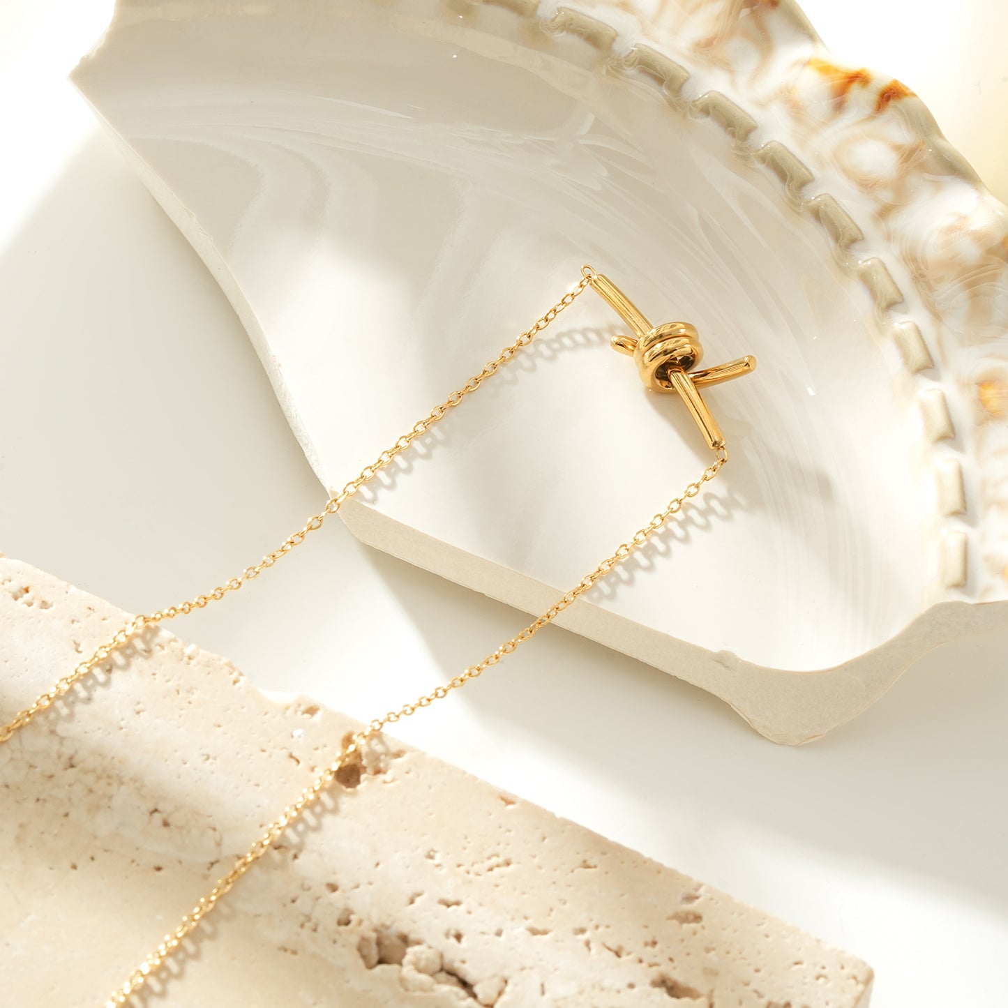 LARISA Gold: Bar Pendant Necklace with Knotted Symbol Detail