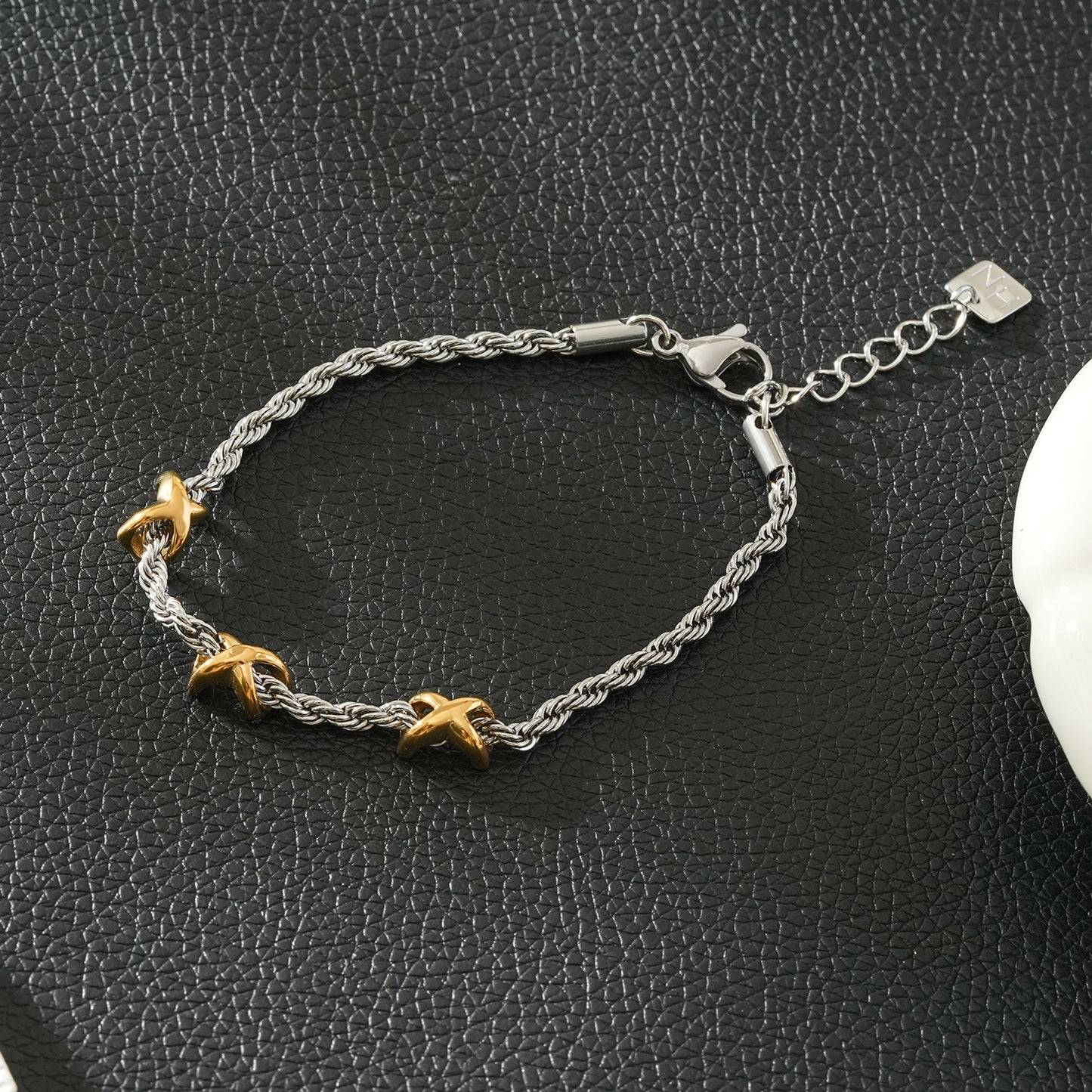 DRAGOSA Mixed Metals: Silver Rope Chain Bracelet with Triple Mini Gold Criss-Cross Charms