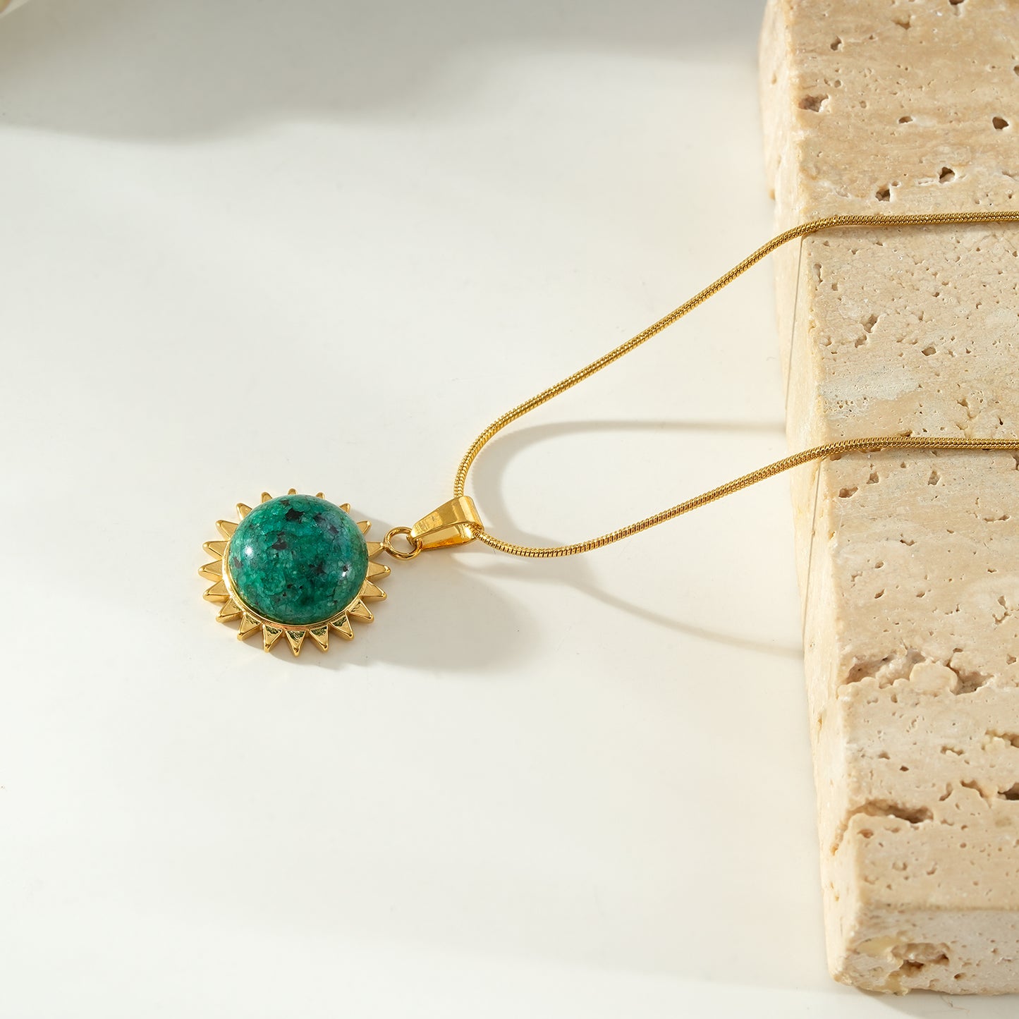 CHIDERA Gold: African Turquoise Sunburst Pendent on a Snake Skin Textured Chain Necklace