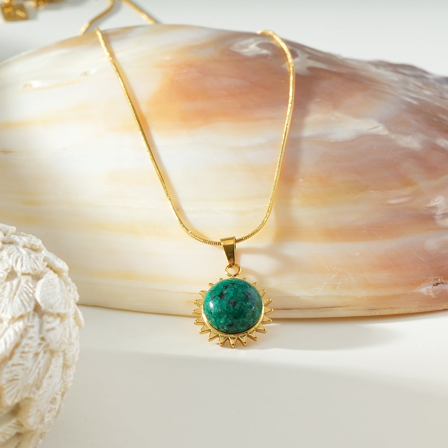 CHIDERA Gold: African Turquoise Sunburst Pendent on a Snake Skin Textured Chain Necklace